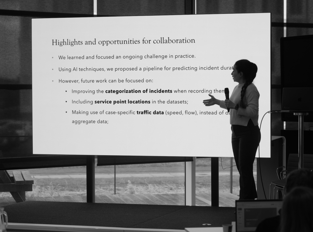 One of the participants presenting the results of their group assignment.